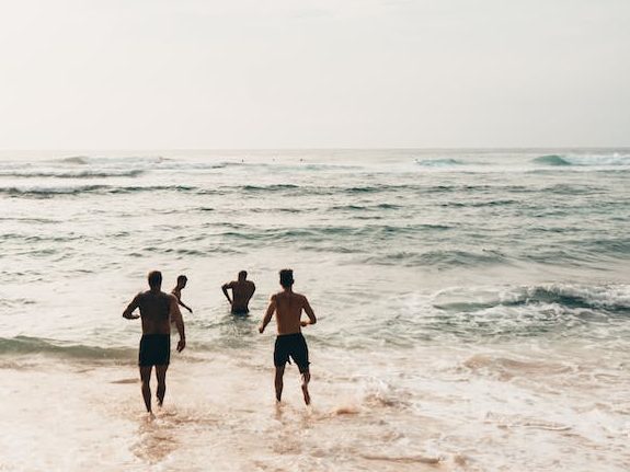 summer beach fun waves group party do today well haiku poem photo